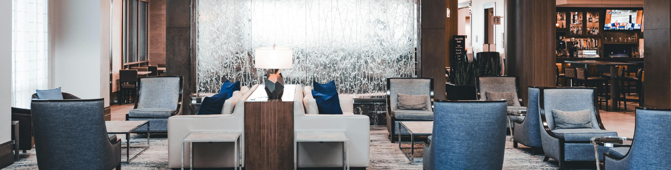 hotel lobby interior chairs and water feature