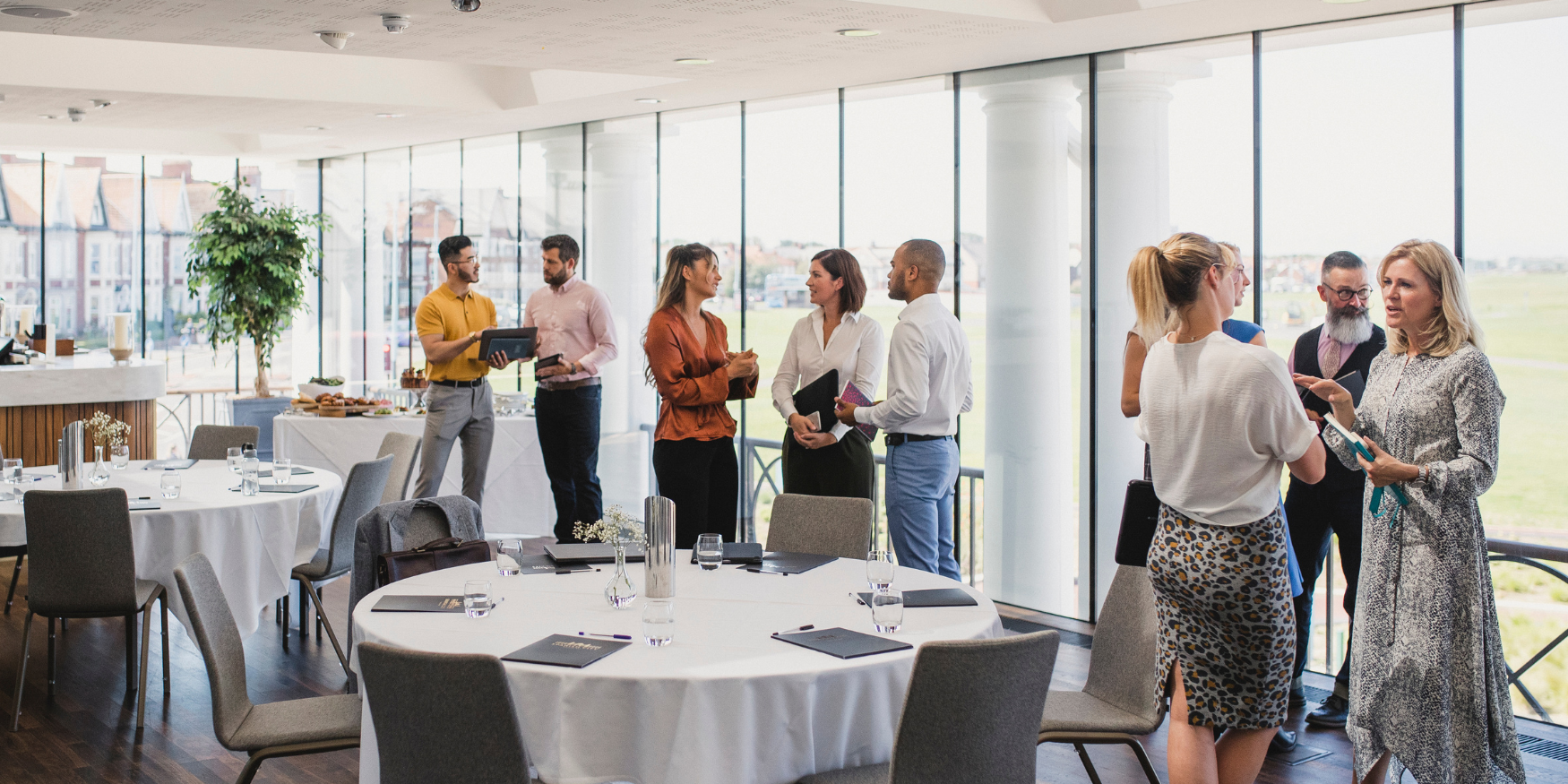 group of event attendees talking to each other