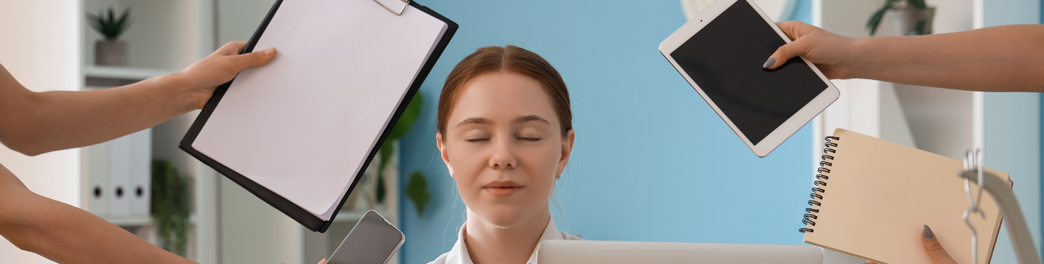 a worker keeping calm while dealing with many pending tasks.